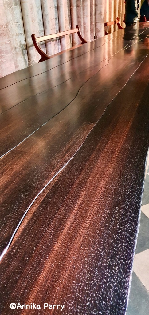"A close-up of the table showing the beautiful patina of the wood."